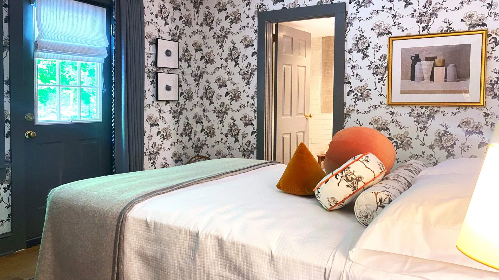 floral wallpaper and private bath access.